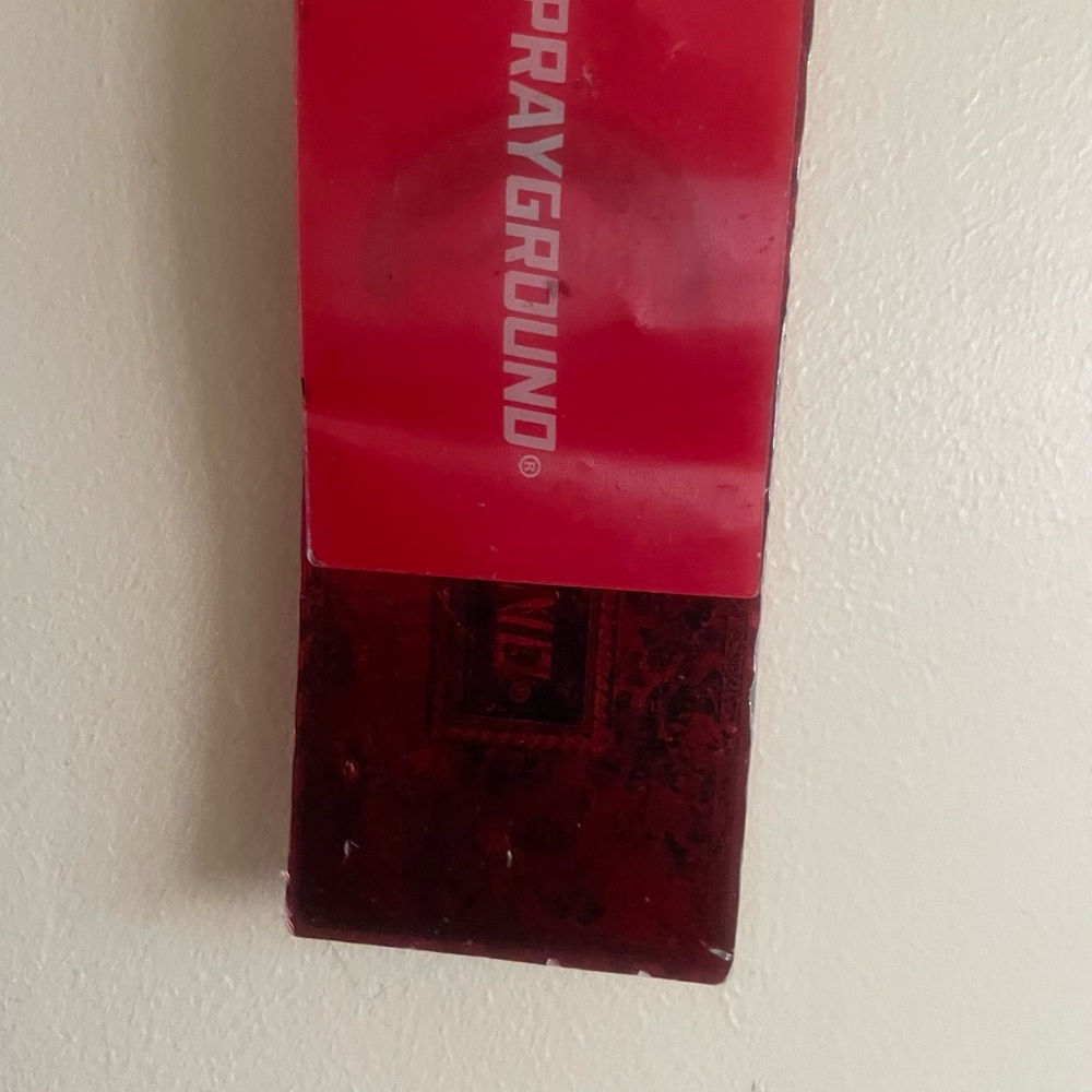 Sprayground Red and Black Cheeto tag 2025